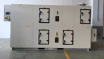Full front view of FXC series combined desiccant wheel dehumidifier with independent PLC control cabinet, manufactured by Zhejiang Fengxing factory for pharmaceutical, food and glass low humidity production workshop