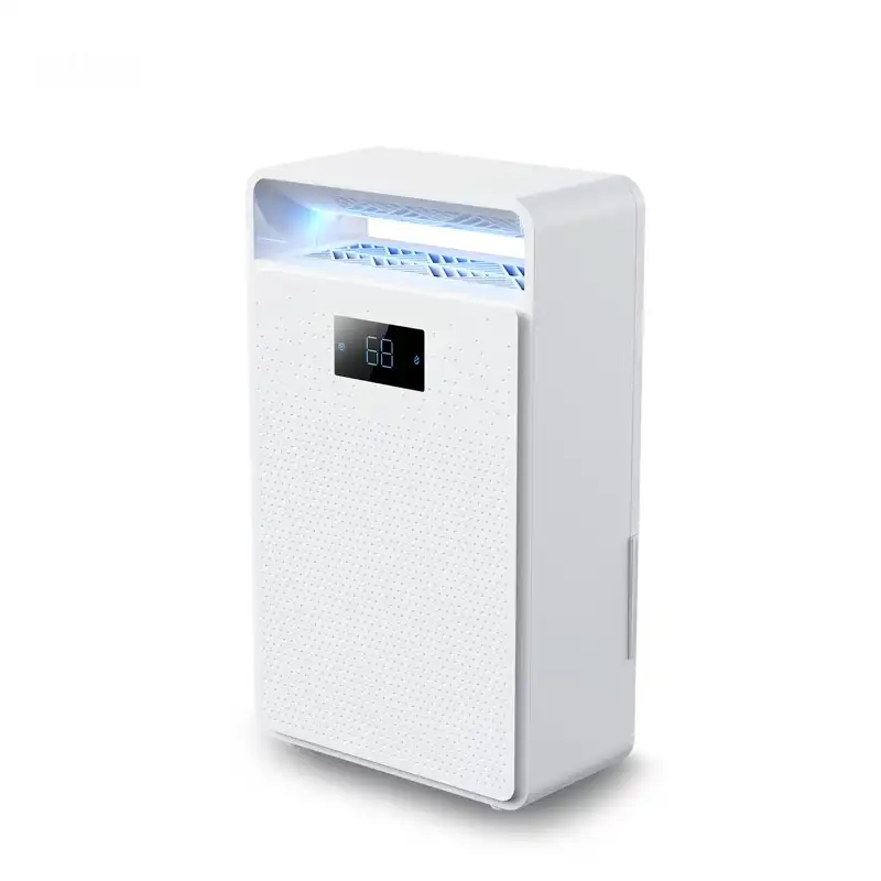 Side perspective of FXRH-450ml household mini refrigerative dehumidifier, blue indicator light on top air outlet, portable lightweight body for indoor moisture control